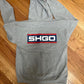 Zip Up Sweatshirt with SHGO on the back.